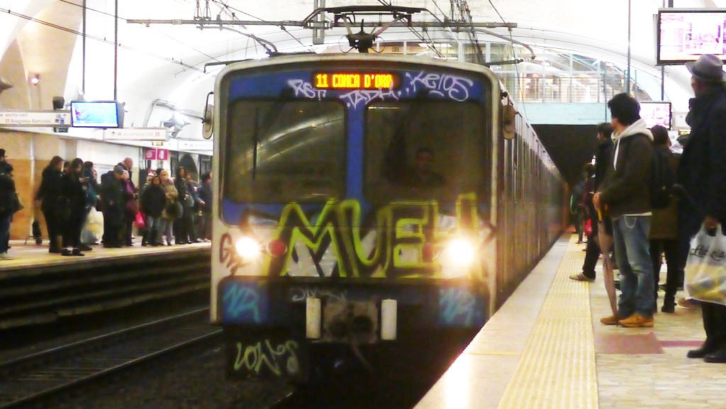 Graffiti tag on Rome Metro train Rome Vacation Tips 1