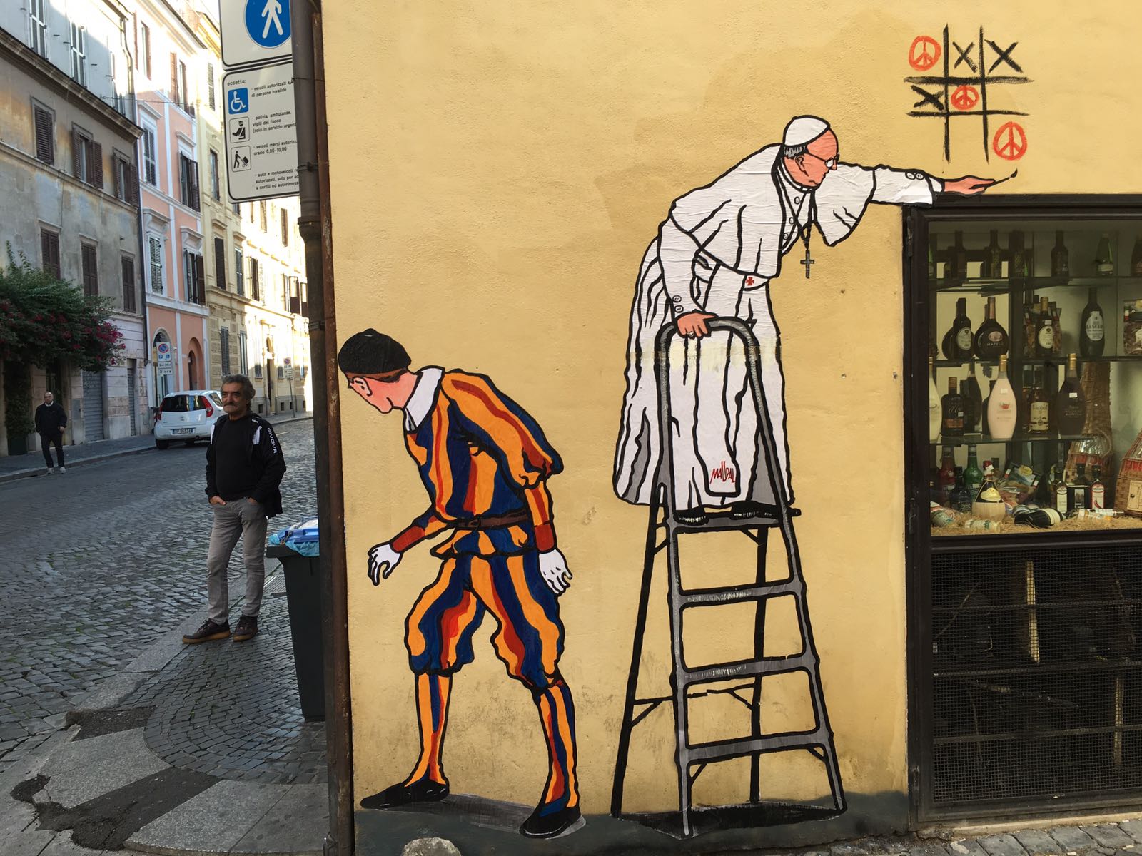 Pope writing graffiti - Rome Vacation Tips